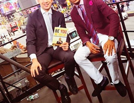 Antonio Edwards on a television set with a host